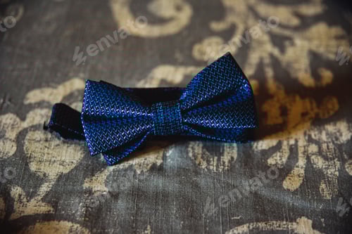 Preview: Blue Textured Bow Tie on Patterned Surface