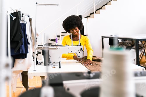 Preview: Female fashion designer at work