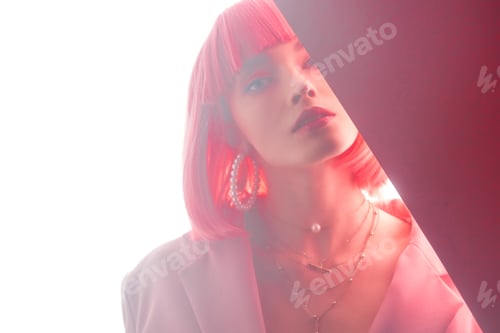 Preview: beautiful woman looking at camera on pink and white