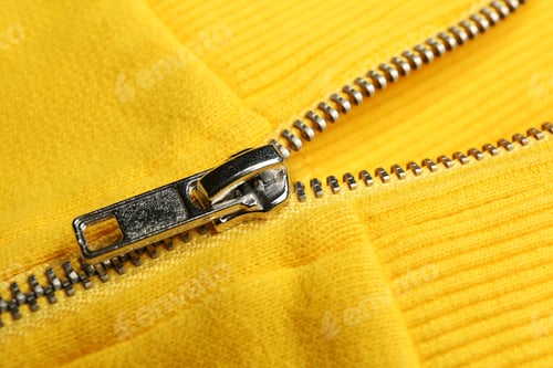 Preview: Yellow sweatshirt with zipper as background, closeup view