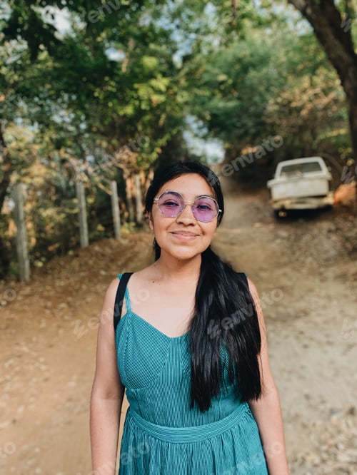 Preview: portrait of a girl in the middle of a road