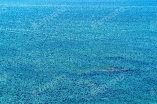 Preview: Background And Abstract Texture Of A Big Empty Surface Of Sea Water With Ripples