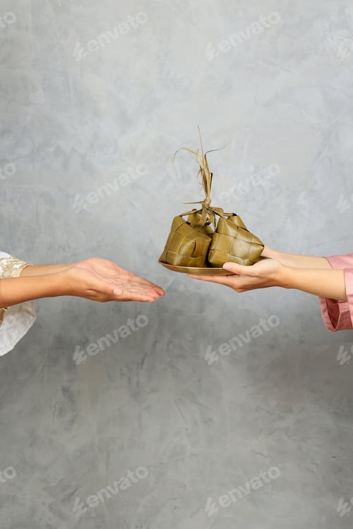 Preview: Sharing Ketupat, Two Female Sharing Diamond Shape Rice Cake