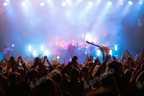 Preview: Crowd at concert and blurred stage lights.