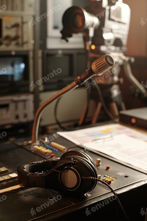 Preview: Headphones lying on sound mixing console