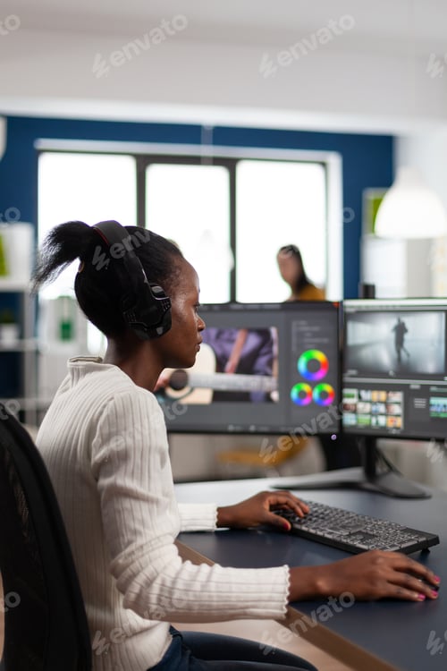 Preview: Black woman videographer developing project film montage