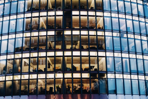 Preview: A repeating pattern of light windows on a skyscraper for business professionals in the city