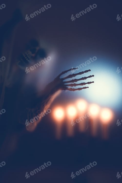 Preview: Mysterious creature with skull under the night light for Halloween