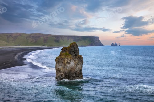 Preview: Impressive view of Kirkjufjara black sand beach from Dyrholaey promontory on Atlantic South Coast.