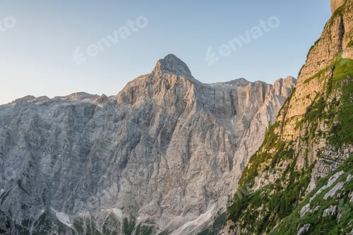 Preview: Sunrise in the mountains. Morning in the Julian Alps over the highest mountain in Slovenia, Triglav.