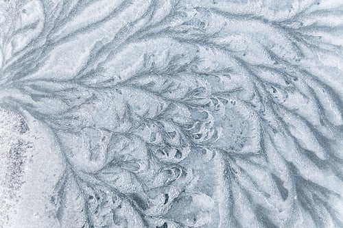 Preview: Abstract ice textures on car window in winter