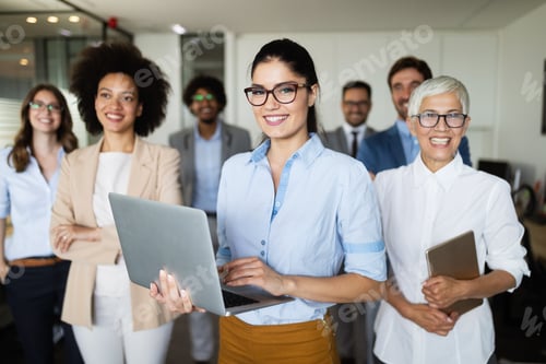 Preview: Successful business group of people at work in office