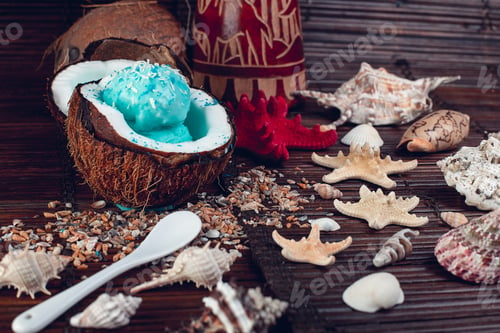 Preview: Blue ice cream in coconut bowl. Summer vacation