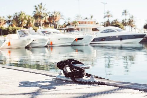 Preview: Mooring yacht rope tied around a cleat