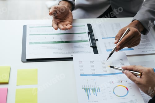 Preview: Close up view of business team discussing about the investment plan for the upcoming project in the