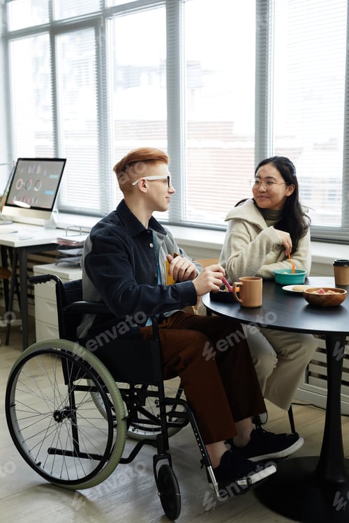 Preview: Young Man using Wheelchair at Work