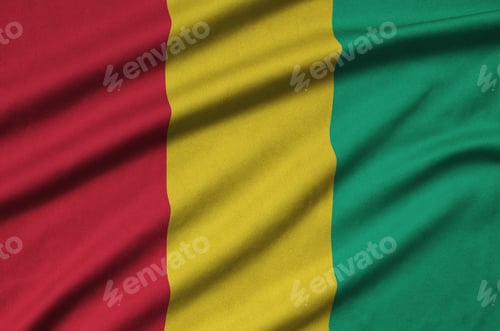 Preview: Guinea flag is depicted on a sports cloth fabric with many folds. Sport team waving banner