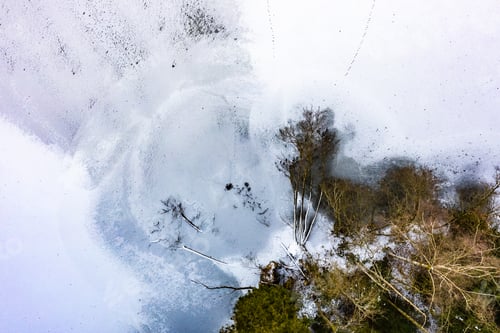 Preview: Aerial view of frozen lake from above