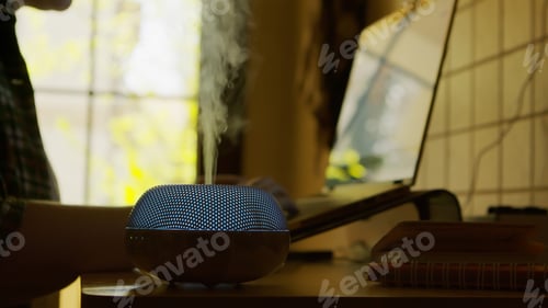 Preview: Vapor coming from blue led esential oil diffuser