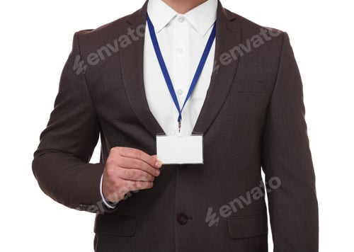 Preview: Man with blank badge isolated on white, closeup