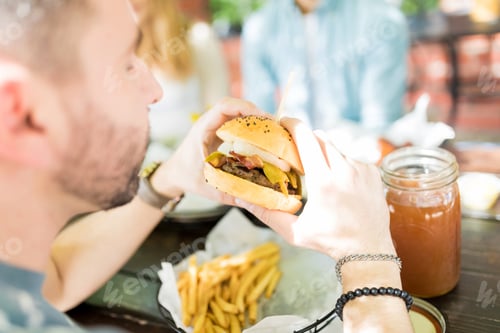 Preview: Man Eating Yummy Burger