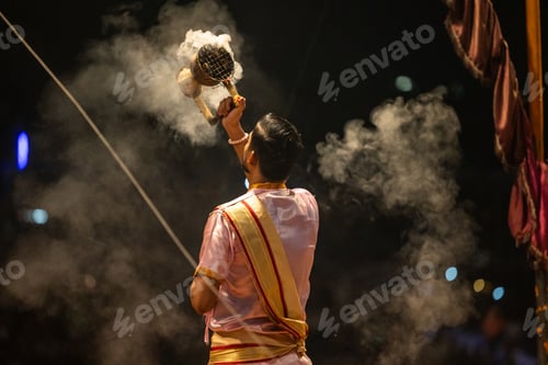 Preview: Hindu Priest Performing Ganga Aarti Ceremony in Varanasi at Night