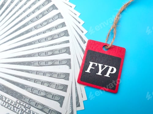 Preview: Banknotes and wooden board with the word FYP.