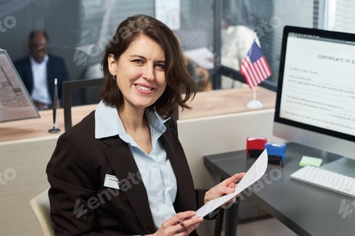 Preview: Portrait of Woman Smiling While Processing Documents at Visa Center