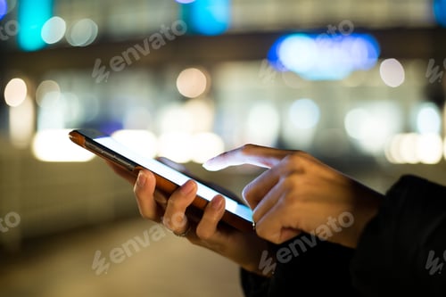 Preview: Woman finger touch on blank screen of cellphone