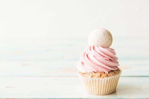 Preview: Delicious Cupcake with Pink Frosting and Macaron