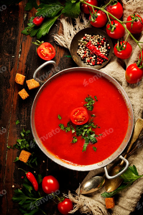 Preview: Homemade Tomato soup on wooden table