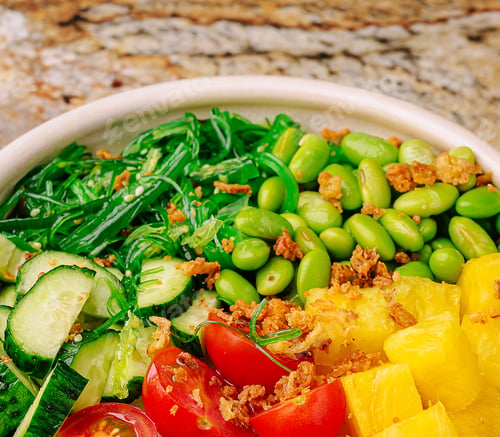 Preview: Fresh salad bowl with vibrant vegetables and fruits prepared for a healthy meal
