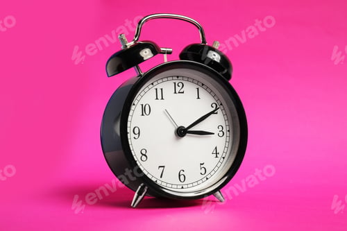 Preview: One black alarm clock on color background