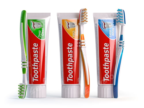 Preview: Toothpaste of different types and toothbrushes of different colo