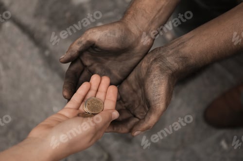 Preview: Woman giving poor homeless person money outdoors, closeup