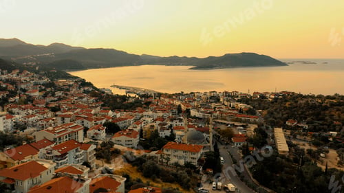 Preview: Top view of resort city architecture, sea bay and mountains.