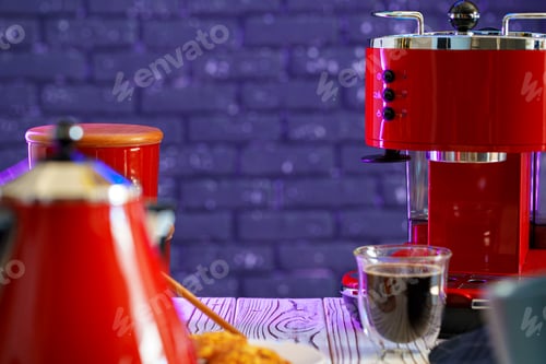 Preview: Red coffee machine on kitchen table close up