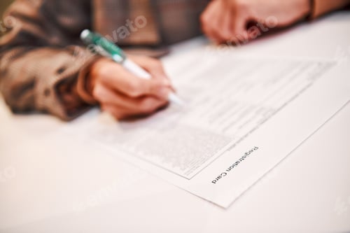 Preview: Businesswoman is fulfilling and signing contract with pen