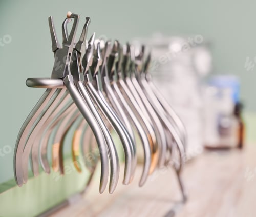 Preview: Collection of orthodontic instruments for dental procedure.