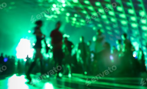 Preview: Abstract blurred people moving on and dancing at music night festival event