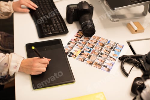 Preview: Cropped image of designer working on digitizer