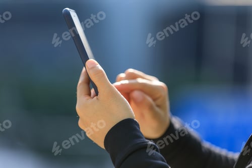 Preview: People use smart phone in modern city