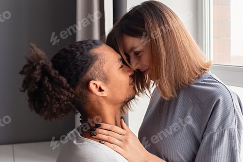 Preview: Multiracial couple, guy and girl face to face