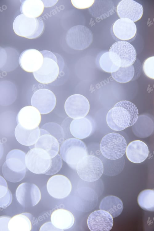 Preview: Abstract white and silver bokeh background for festive and elegant visuals