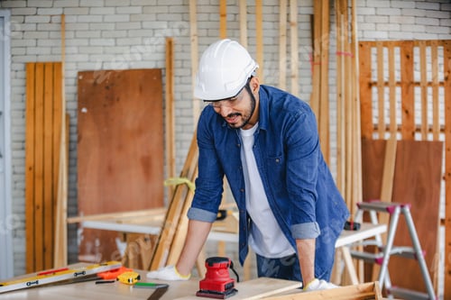 Preview: Carpenter working in carpentry shop. Carpenter working to making wood furniture in wood workshop