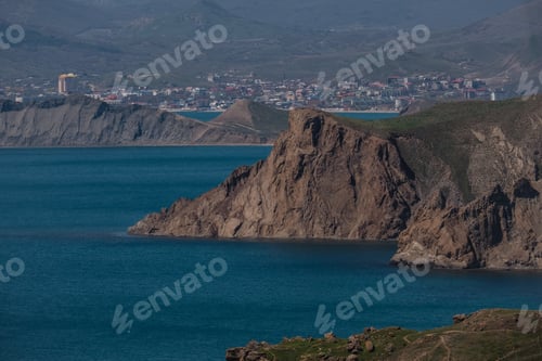 Preview: Beautiful green slopes of the mountains by the sea.