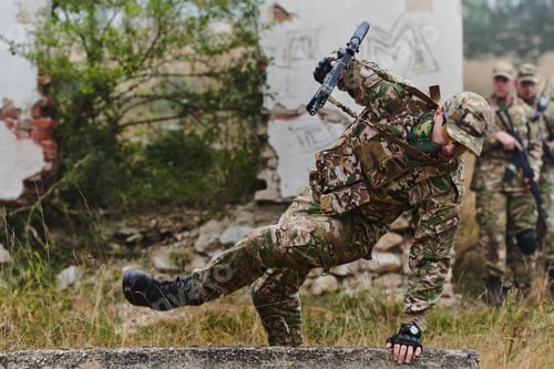 Preview: A highly trained elite military unit, clad in camouflage, skillfully navigates through perilous