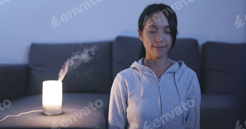 Preview: Woman having meditation at home