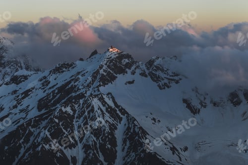 Preview: Panoramic view of high mountain peaks in beautiful morning light. Hiking and climbing in Elbrus