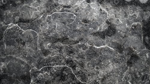 Preview: High angle view of stones covered in water - a cool picture for backgrounds and wallpapers